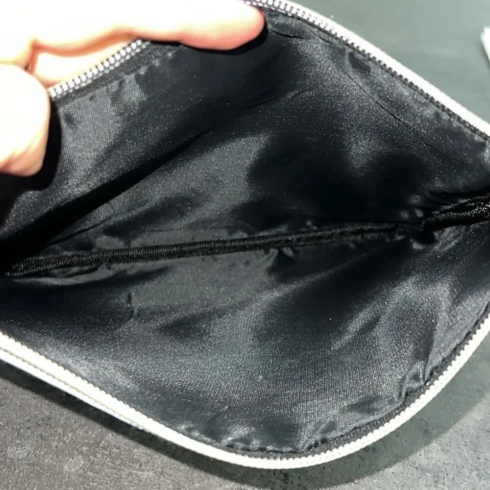 FREE with any purchase $50 [ NWT make up pouch
